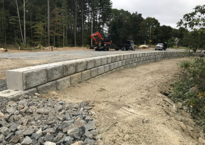 Residential road with cement block retaining wall